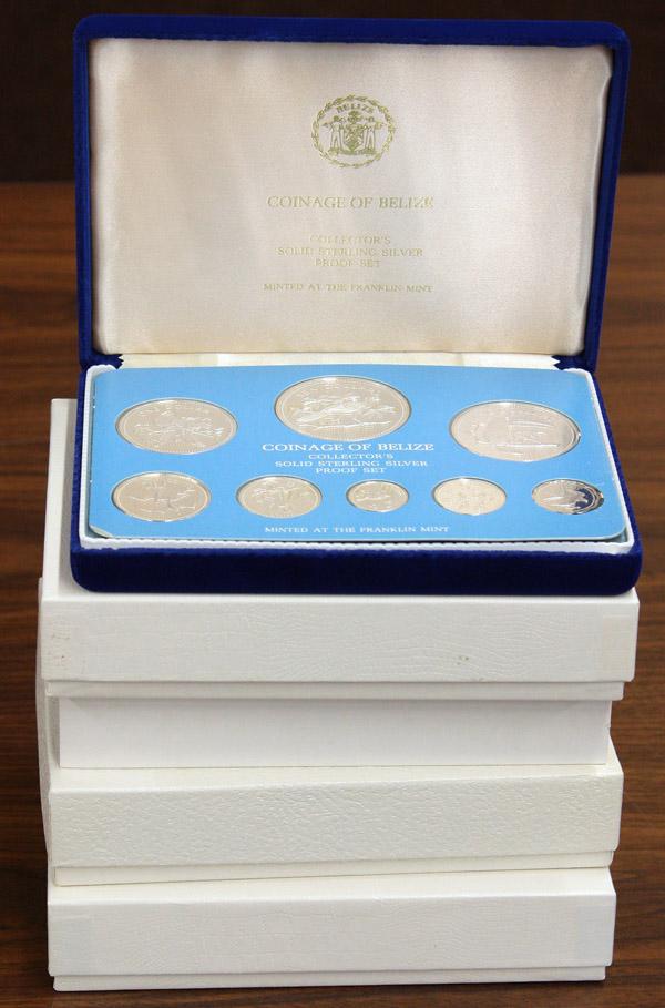 Belize Franklin Mint Proof Set: (lot of 4) Belize Proof Sets. Includes three sterling silver sets dated 1975, 1976, 1981 and one standard set dated 1978. All in boxes, most with certificates