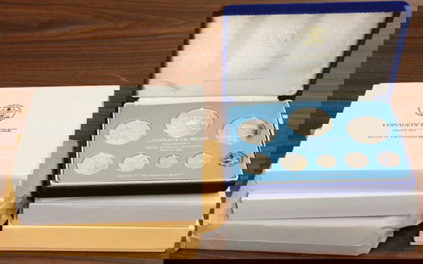 Belize Franklin Mint Proof Sets: (lot of 5) Belize Proof Sets dated 1974, 1974, 1975, 1977, 1983. All in boxes with certificates