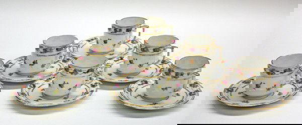 German porcelain demitasse set: (lot of 12) German porcelain demitasse service for six, having a gilt and floral pattern, marked Dresden hand painted Germany, 2.5''h