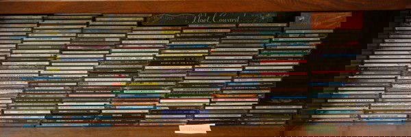 Crooner vocalist compositions on cd: (lot of 100+) One shelf of sealed crooner vocalist compositions on cd including Whispering Jack Smith, Crazy Otto, Noel Coward, Nelson Eddies, Hoagy & Carmichael, etc., some double sets