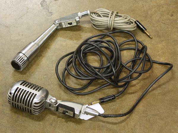 Shure 555W & Calrad DM-21 microphones: Lot of audio equipment, including a Shure model 555W microphone, a Calrad DM-21 microphone, two Realistic condenser microphones, and a case full of audio cables