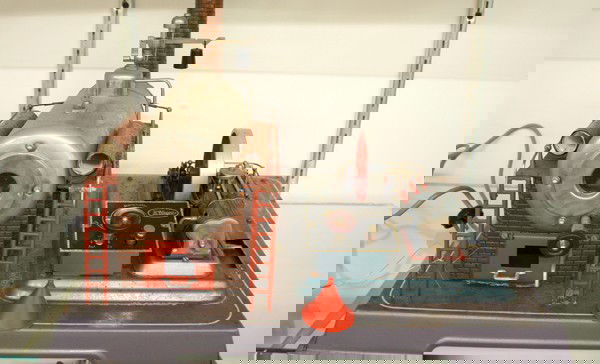 Wilesco model steam engine power plant: Wilesco model steam engine with a steel boiler, monometer instrument panel, , copper plated boiler house, with embossed brick type walls, fire door, 2 footbridges with railing, 2 ladders, double actio