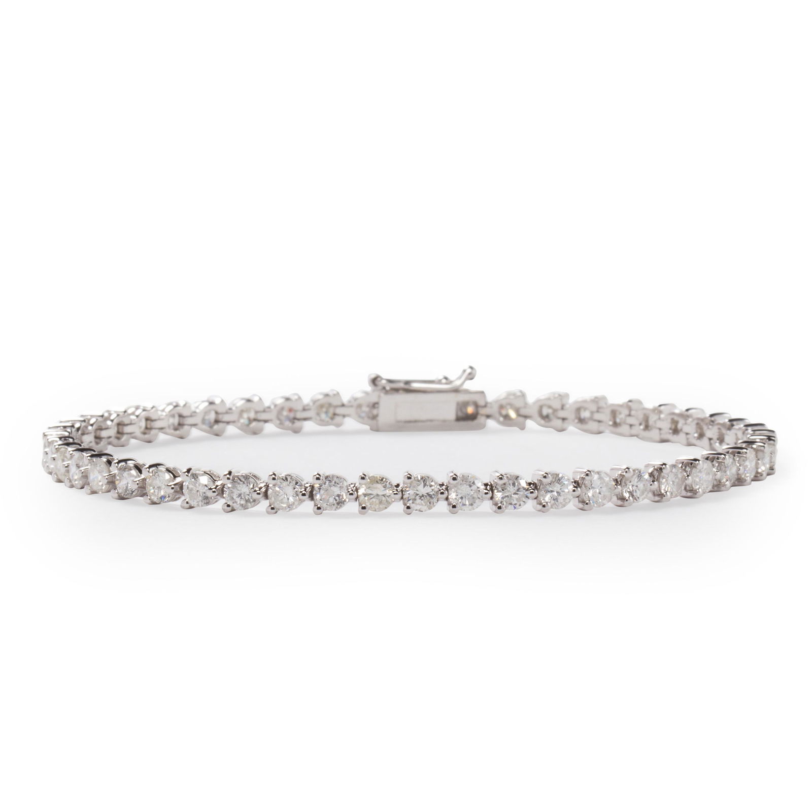 A diamond and fourteen karat white gold bracelet (1 of 2)