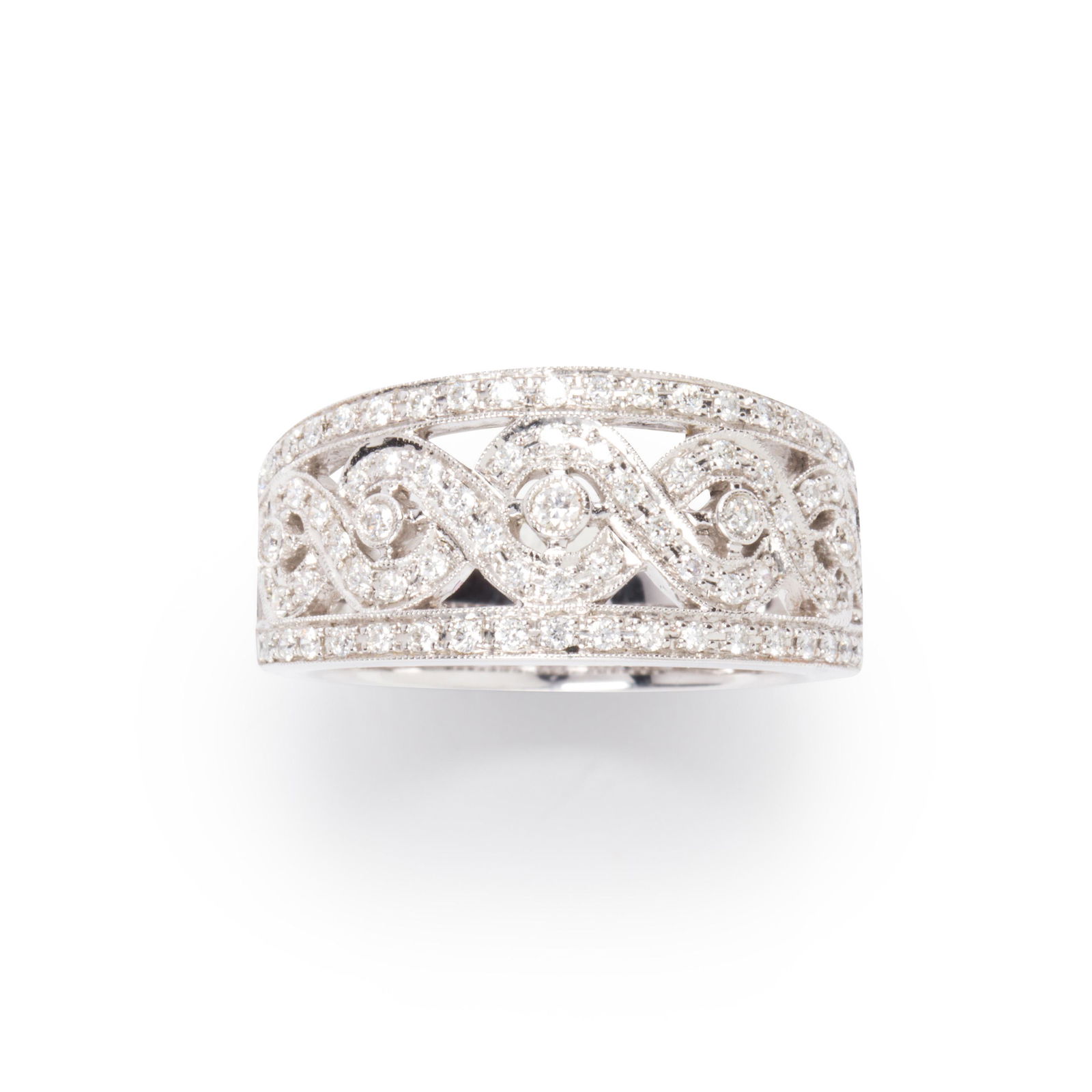 A diamond and fourteen karat white gold band ring (1 of 2)