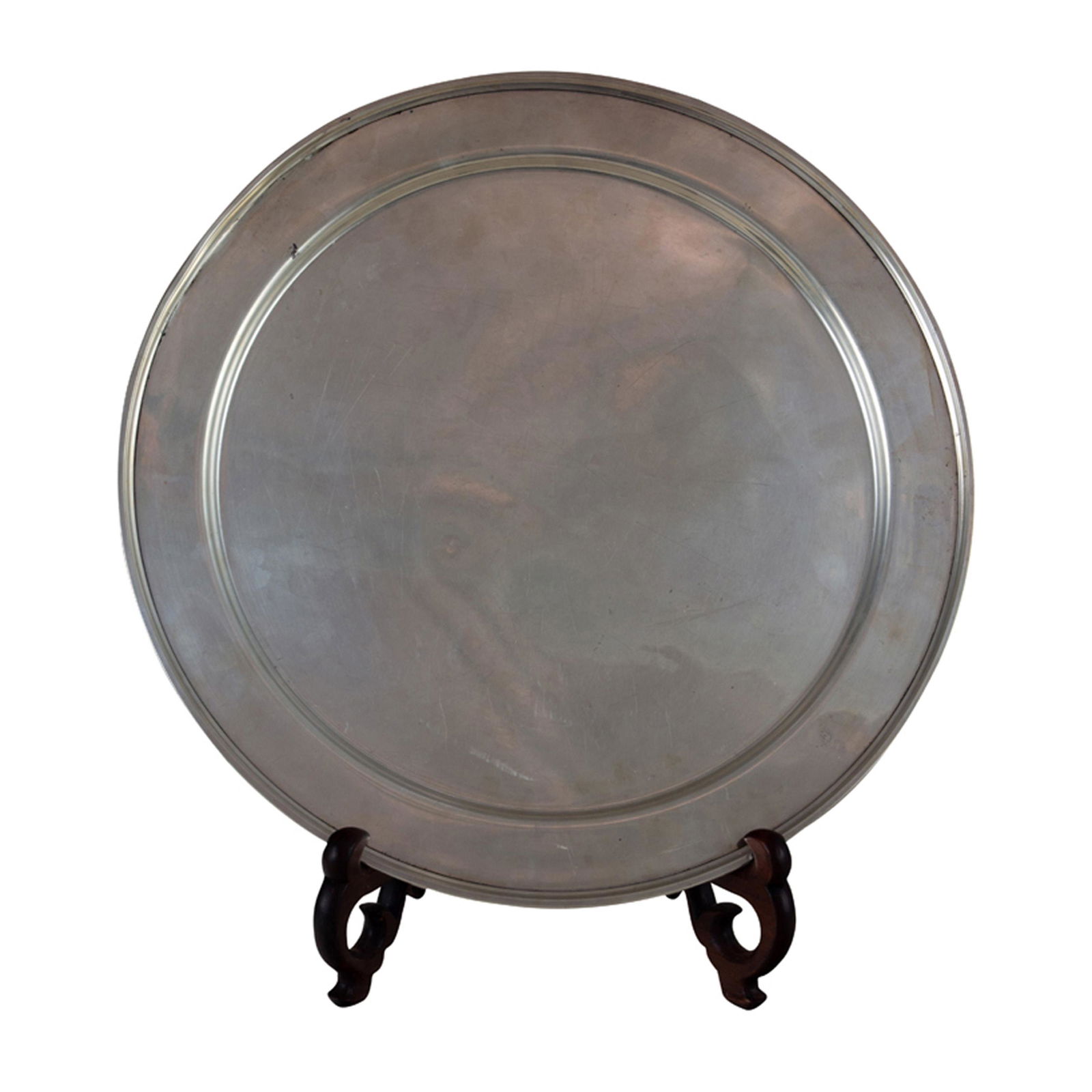 A Dunkirk sterling tray, the circular form with ribbed: A Dunkirk sterling tray, the circular form with ribbed rim, 14"d, 21 toz. Provenance: Property from the estate of Patricia Moffat Pope, San Francisco, CA