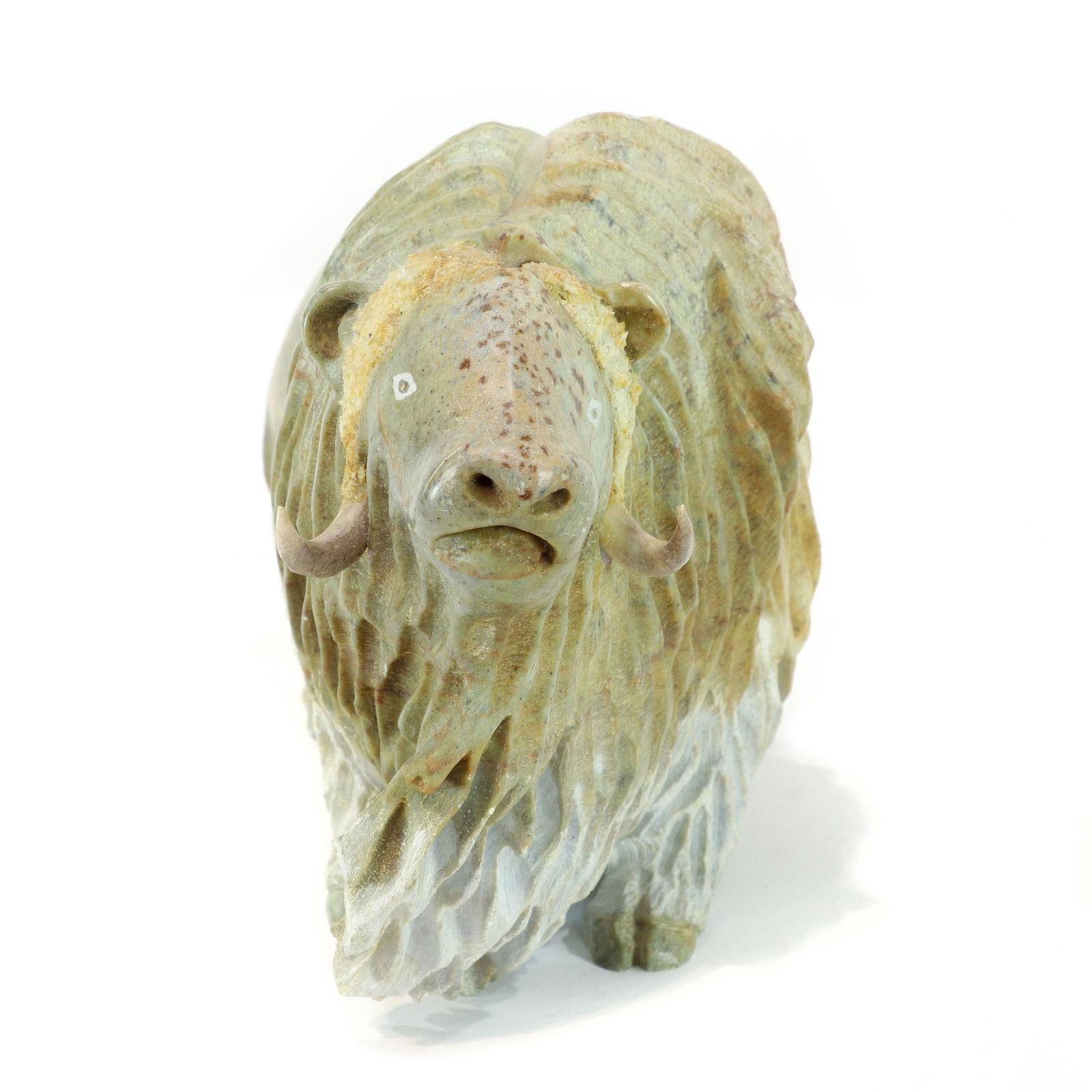 A Derrald Taylor Inuit carved stone muskox, signed 'D (1 of 5)