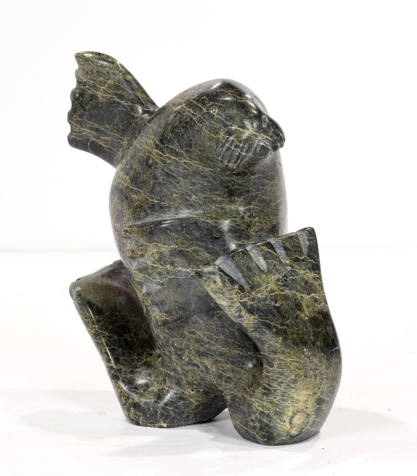 An Adamee Inuit stone carving of a walrus (1 of 5)