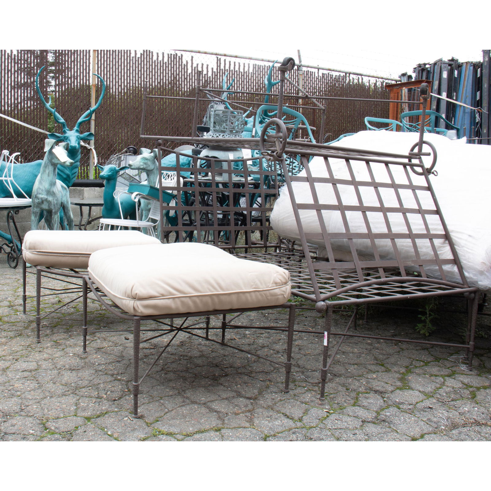 (lot of 4) A pair of Michael Taylor 'Montecito' style: (lot of 4) A pair of Michael Taylor 'Montecito' style patinated metal outdoor chaise lounges, each having spherical finials surmounting an adjustable back terminating at the rear casters, 38"h x 34"w