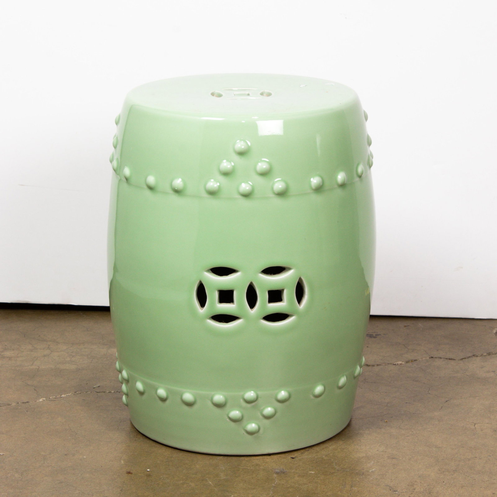 Chinese celadon glazed garden stool: Chinese celadon glazed garden stool, 17"h.