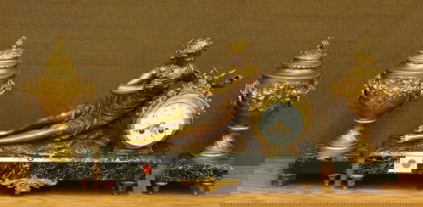 Sculpture by Ruffony, gilt garniture set: Sculpture by Ruffony, patinated and gilt bronze garniture set, depicting a beauty at rest, one hand is grasping a spring bouquet, the other resting on the clock case and cradling a pair of doves, the