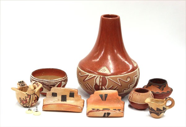 Native American pottery: (lot of 9) Native American pottery items including three from Hopi Pueblo, one Isleta bowl, pair of earrings, San Juan bowl, a large Santa Clara Olla signed Carmel Romero (cracked), and a possibly Zia