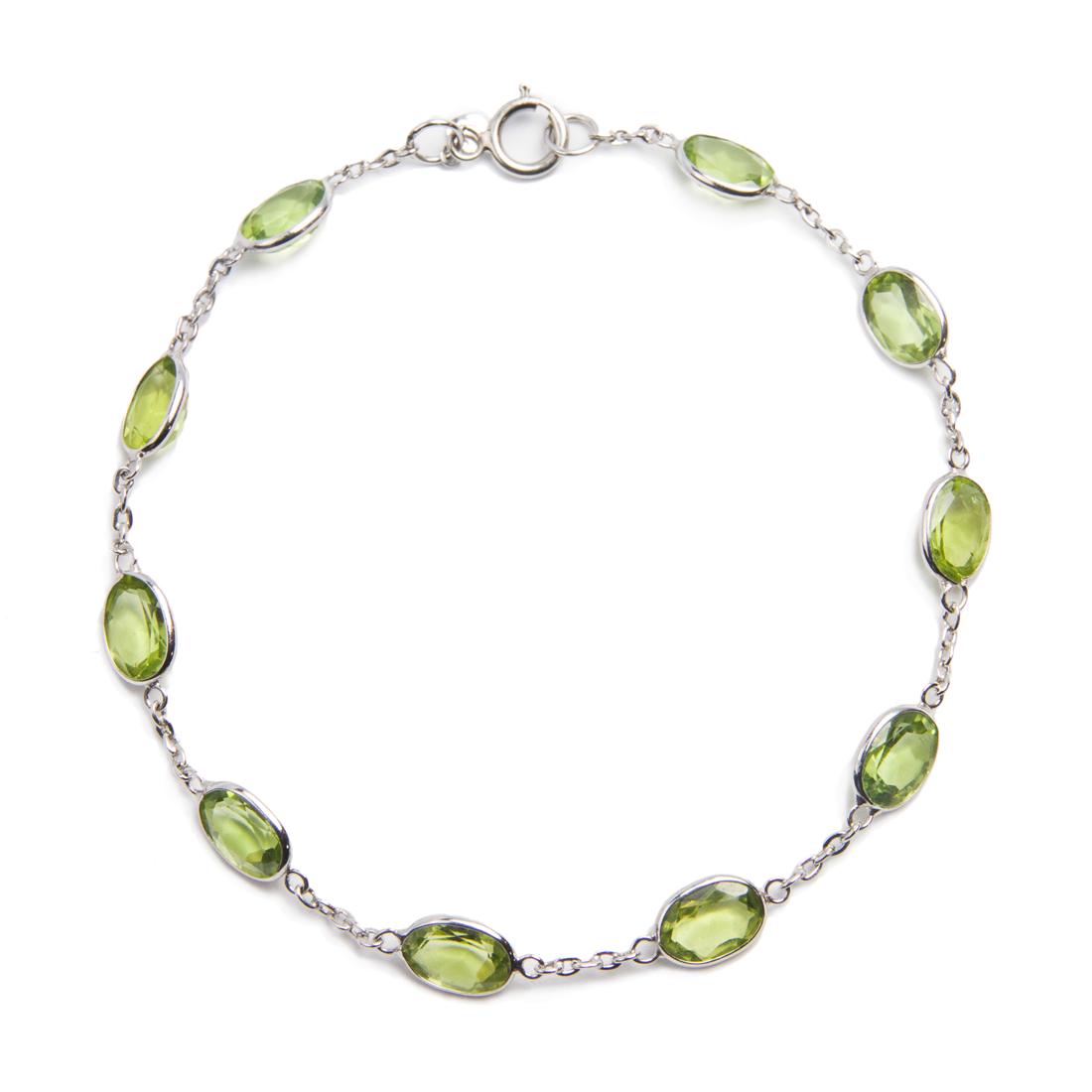 A peridot and eighteen karat white gold bracelet (1 of 2)