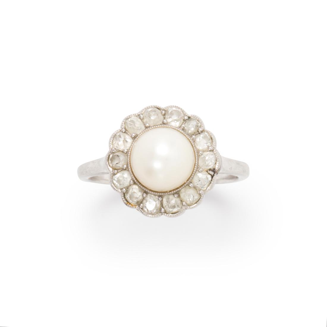 A pearl, diamond and platinum ring (1 of 2)