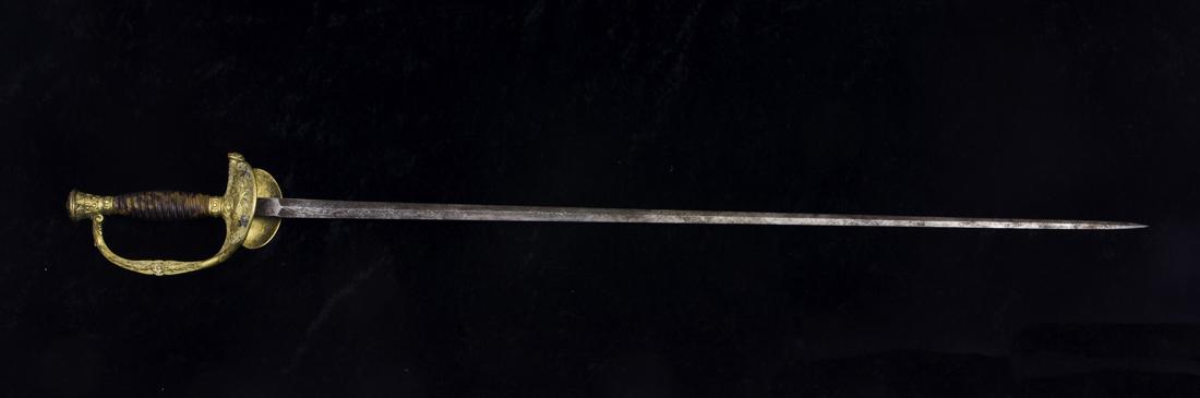 A French rapier sword, Jules Maria: A French rapier sword, Jules Maria. Paris, the pommel inscribed E.C. with a crown, a faux tortoise molded grip, the gilt kidney shaped guard cast with a laurel branch trophy with silver stars, the bac