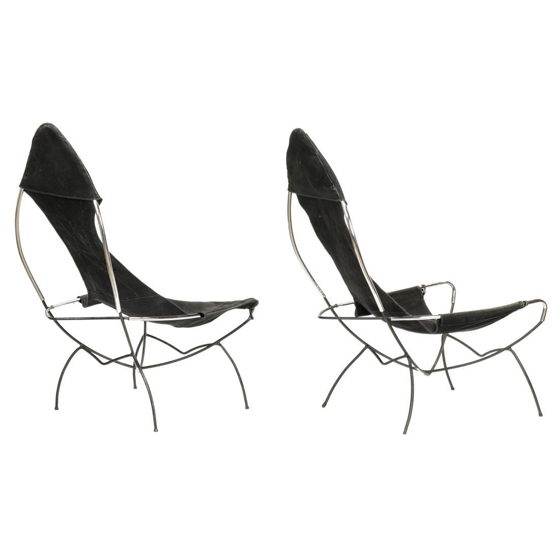 A pair of Tony Paul sling chairs (1 of 3)