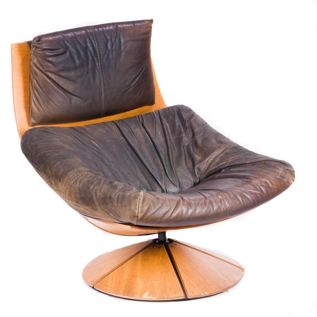 A Gerard Van Den Berg (Dutch b. 1947) swivel lounge (1 of 3)