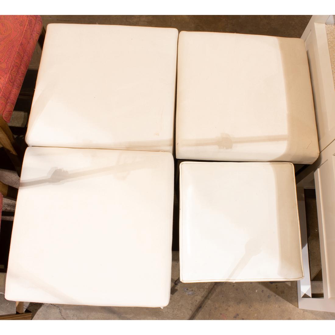 (lot of 4) Paul McCobb for Planner Group attrib. stools: (lot of 4) Paul McCobb for Planner Group attrib. stools, each having black iron tubuar legs, consisting of one smaller and three larger, 16"h x 20"w x 19.5"d.