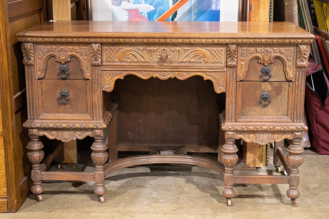 Renaissance Revival style desk: Renaissance Revival style desk, having five drawers, 32"h x 50"w x 20"d