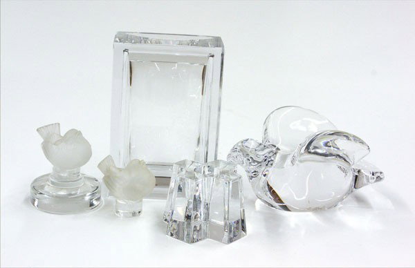 Baccarat crystal group: (lot of 5) Group of crystal, including a Baccarat geometric paperweight and candleholder, an Orrefors bird sculpture, and and two Lalique, France frosted birds, largest 4.5''h