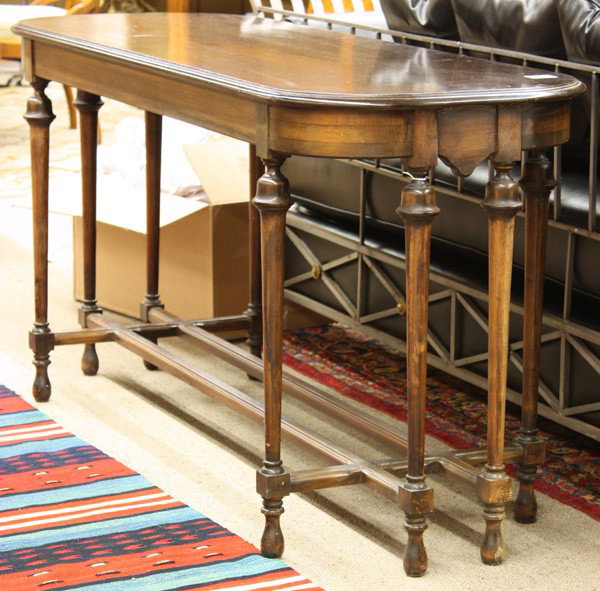 Edwardian console table: Edwardian style console table, having a rectangular top above the eight leg base conjoined by an H stretcher configuration, 30.5''h x 60''w x 22''d