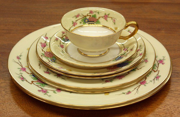 Lenox Mandarin porcelain table service: (lot of 91) Lenox Mandarin porcelain table service for twelve, with a cream ground, and decorated with flora in the Asian style, including 12 dinner plates 10.5''w, 12 salad plates 8.25'', 14 dessert 