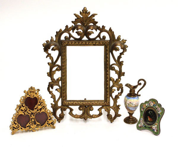 Frames and a ewer: (lot of 4) Three frames including a Victorian brass with square image in the Rococo taste, 12''h; together with a brass ewer having a hand-painted landscape scene with a couple in period dress, 4.75''