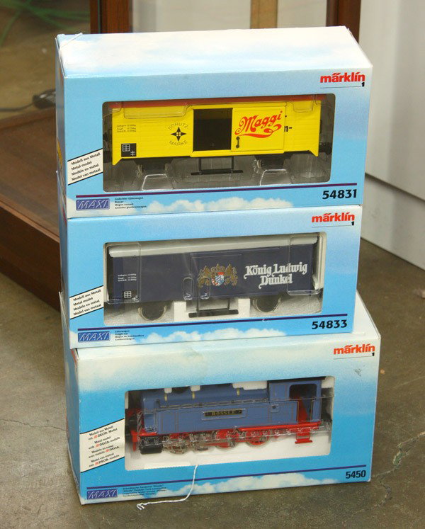 Model train cars: (lot of 3) Model train cars, all Marklin 1 gauge, including ''Rossie Swabian Tank Locomotive'' serial number 5450, ''Gedeckter Guterwagen Boxcar'' serial number 54831, and ''Guterwawgen Freightcar'' s