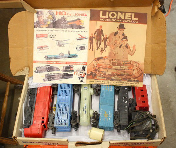 Lionel trains: (lot of 2) 2 boxes of Lionel model trains and track, including ''The Texas Special'' set, serial number 1105, includes 5 cars, a locomotive and a toy transformer, plus another box containing 24 pieces