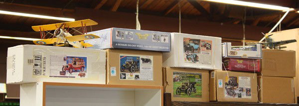 Scale model vehicles: (lot of 12) Scale model vehicles, vintage model automobiles and airplanes, including a 1931 Ford Tudor, 1917 Rio Touring, 1910 Model T (2), and a Miller Brewing truck, all in original boxes, airplanes