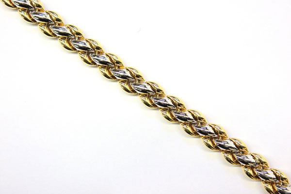 Chimento bracelet: CHIMENTO bracelet; mounted in 18k yellow and white gold, clasp set with one (1) diamond accent. Total bracelet weight 20.3 grams. Bracelet length 7''