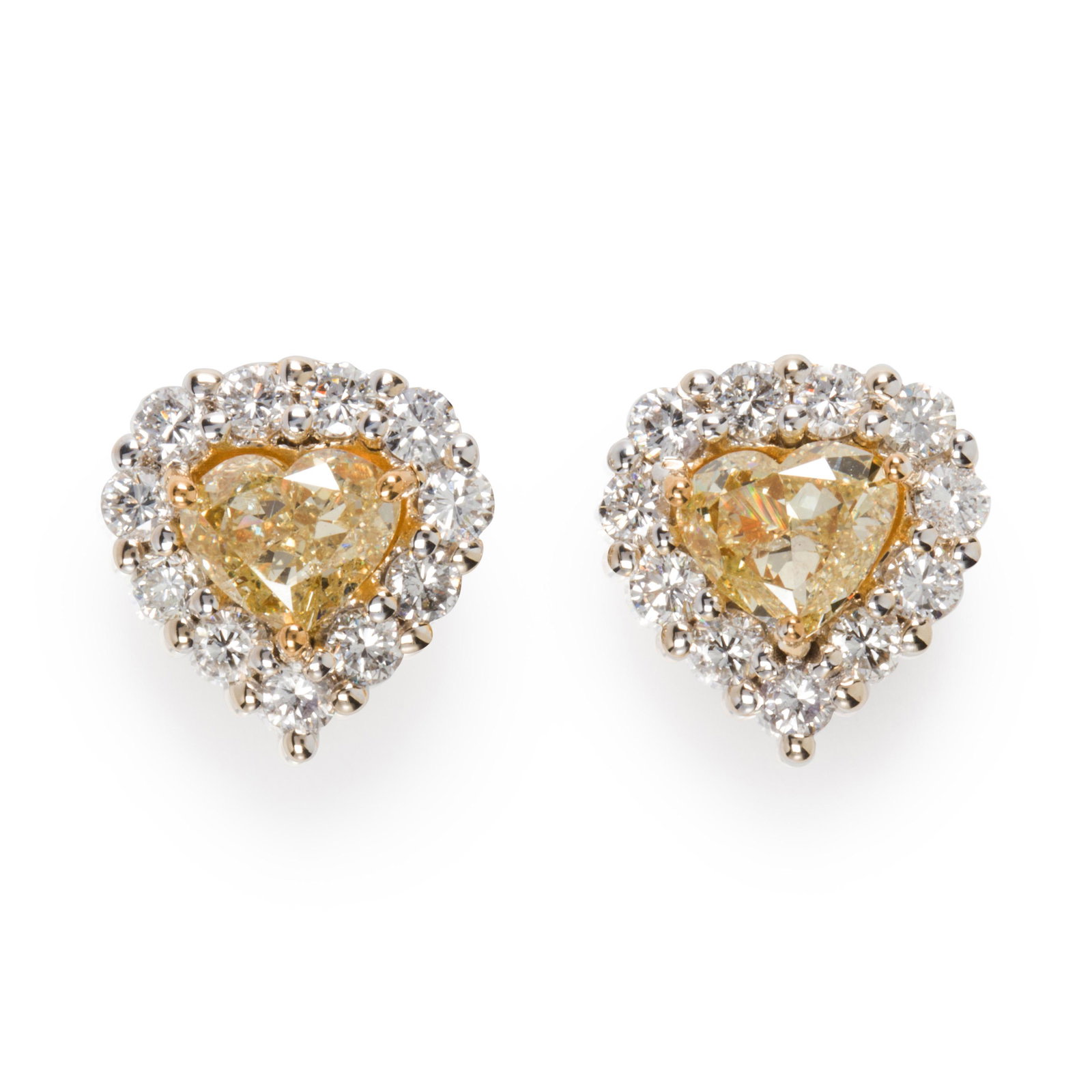A pair of yellow diamond and diamond earrings: A pair of yellow diamond and diamond earrings each designed as a heart-cut yellow diamond, weighing approximately 1.00 carats, framed by round brilliant-cut diamonds, in eighteen karat white gold; est