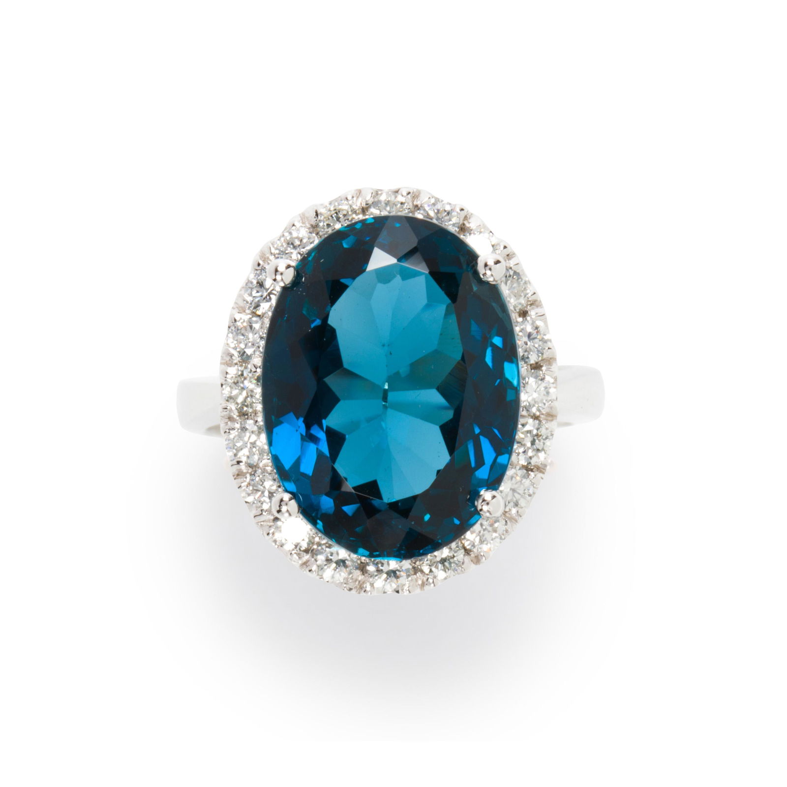 A blue topaz, diamond and fourteen karat white gold (1 of 2)