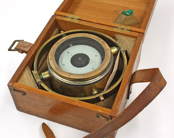 Brass navigation binnacle compass: Brass navigation binnacle, with a gimbaled compass, housed in a brass case, includes a fitted mahogany case, 10''h x 10'''w x 4''d