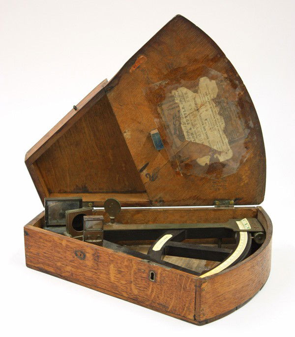 Radius ebony octant by W.F. Cannon: Radius ebony octant by W.F. Cannon, London, with bone scale divided 0-100, 11'' scale, brass index arm with bone vernier, tangent-screw and clamp, pinhole sight, mirror and shades, on turned brass spi