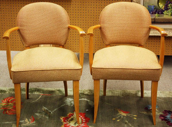 Gilbert Rohde for Herman Miller armchairs: (lot of 2) Pair of Gilbert Rohde for Herman Miller upholstered beech armchairs, circa 1930, upholstered in an orange colorway (original fabric), raised on tapered legs, 32''h x 23''w x 21''d