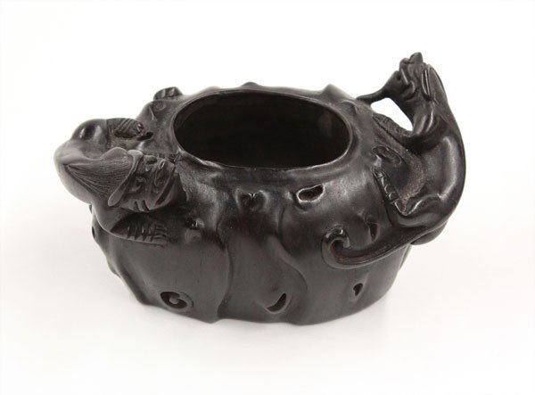 Chinese Wooden Brush Washer: Chinese dark hardwood brush washer, the compressed oval form vessel shaped as the trunk of a tree accented by apertures, the shoulder surmounted by a pair of sinuous chilong, 4''w