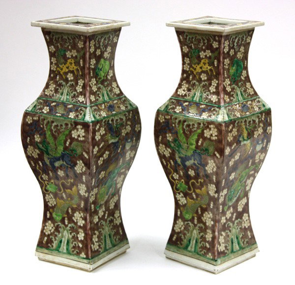 Pair Chinese Enameled Baluster Vases: Pair of Chinese polychrome enamel decorated porcelain baluster vases, each of square section with an everted rim above a waisted neck and tapering to a flared foot, painted overall in a modified famil
