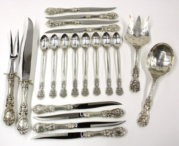 Reed & Barton sterling flatware: Reed & Barton sterling silver flatware in the ''Francis I'' patterin consisting of seven iced tea spoons, salad serving fork and spoon, eight steak knives, and a carving fork and knife, 17.70 troy oz.