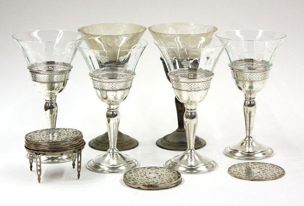 Elgin sterling stems: (lot) Elgin Silversmith Co. sterling silver stems with etched crystal inserts, 10.62 troy oz., together with a stacked group of 10 silver overlay coasters, on stand