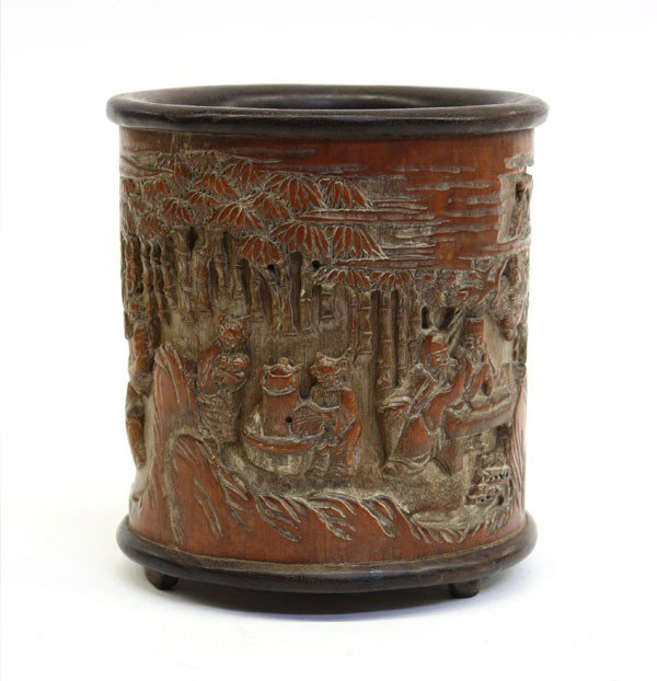 Chinese Bamboo Brush Pot: Chinese carved bamboo and wood brush pot, the cylindrical bamboo segment with a continuous scene of scholars engaged in elegant pursuits within a bamboo grove and accompanied by young attendants, all 