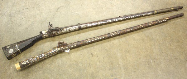 Persian flintlock Jezail rifles: (Lot of 2) Persian flintlock rifles, ''camel'' Jezail, early nineteenth century, both flintlocks are untouched, each with inlaid mother of pearl, one in original flintlock configuration and made with 