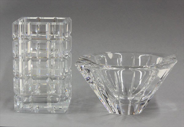 Orrefors vase: (lot of 2) Orrefors Sweden crystal vase, having a tapering form with a cut vertical detail 4''h x 8''w, together with a square crystal vase having a stacked cubic body 6''h, unsigned