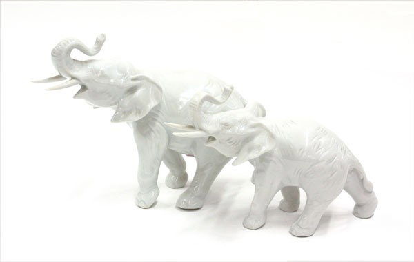 Royal Dux porcelain elephant figurines: (lot of 2) Royal Dux porcelain elephant figurines, each with a clear ground, and clear glaze, marked on the underside with a unglazed Royal Dux Czechoslovakia, an applied pink porcelain triangular pla