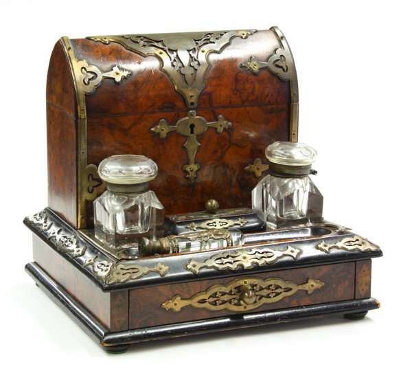 Victorian burl walnut & part-ebonized desk stand: (lot of 2) Victorian burl walnut and part-ebonized desk stand, late 19th century, mounted with brass strapwork, the case with a Gothic domed lid casket, opening to reveal a satin wood interior, the in