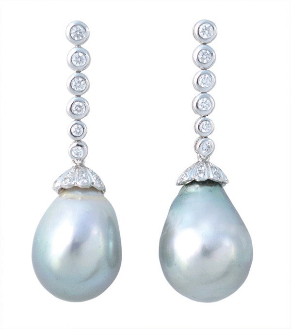 Pair of Tahitian pearl diamond white gold earring: Tahitian baroque cultured pearl and diamond dangle earrings; mounted in 18k white gold, set with (2) grey Tahitian cultured pearls measuring 13.51 mm and 12.80 mm, (12) round bezel set diamonds and (3