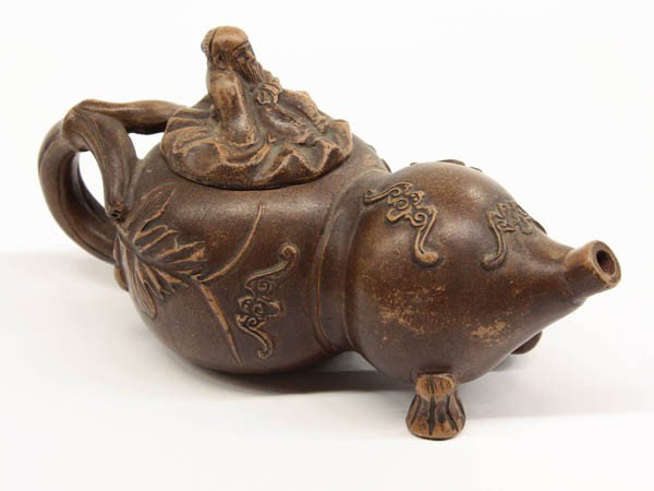 Chinese Yixing Ceramic Teaport, Double Gourd: Chinese Yixing clay teapot of double gourd form, scattered with five auspicious bats in relief along with a branch form handle suspending small gourds and leafy foliage, the underside with cartouche '