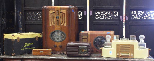 Tube radios and accessories: (lot of 6) Group of tube radios and accessories, including a Westinghouse tombstone, Stewart-Warner Art Deco, Porto Baradio libation console, Zenith technicians vacuum tube case with tubes, Zenith Bak
