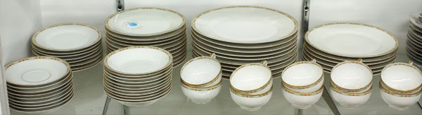 Limoges table service: Limoges porcelain table service by Theodore Haviland comprising ten dinner plates, six salad plates, eleven dessert plates, eight bread plates, eleven berry bowls, ten cups, and nince saucers