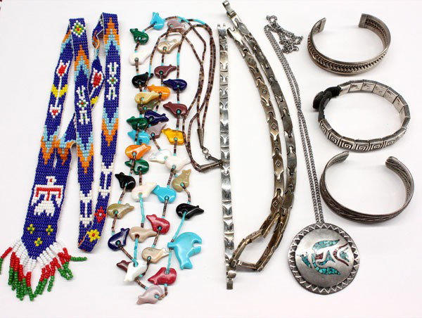 Native American Mexican jewelry: Bag of jewelry items including Native American and Mexican sterling including rings, bracelets, pendants, a fetish necklace, etc