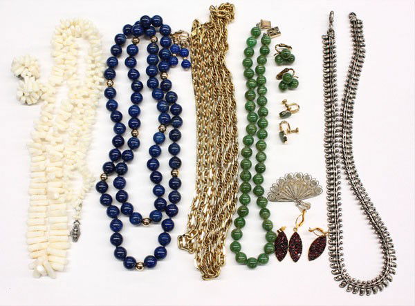 Collection of jewelry: Collection of miscellaneous fashion jewelry items, including; lapis necklace and earrings, coral necklace and earrings, jade necklace and earrings, Monet necklace, beaded chocker, silver necklace and